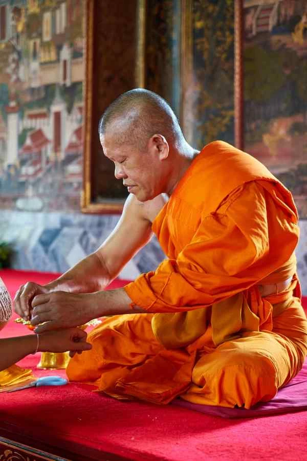 Monk giving blessing Thailand