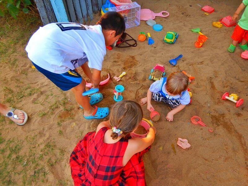 Ginger Farm Chiang Mai kids playing in sandbox kids sandbox Ginger Farm Chiang Mai